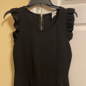 Black ruffled sleeveless pantsuit. Size small.  Used